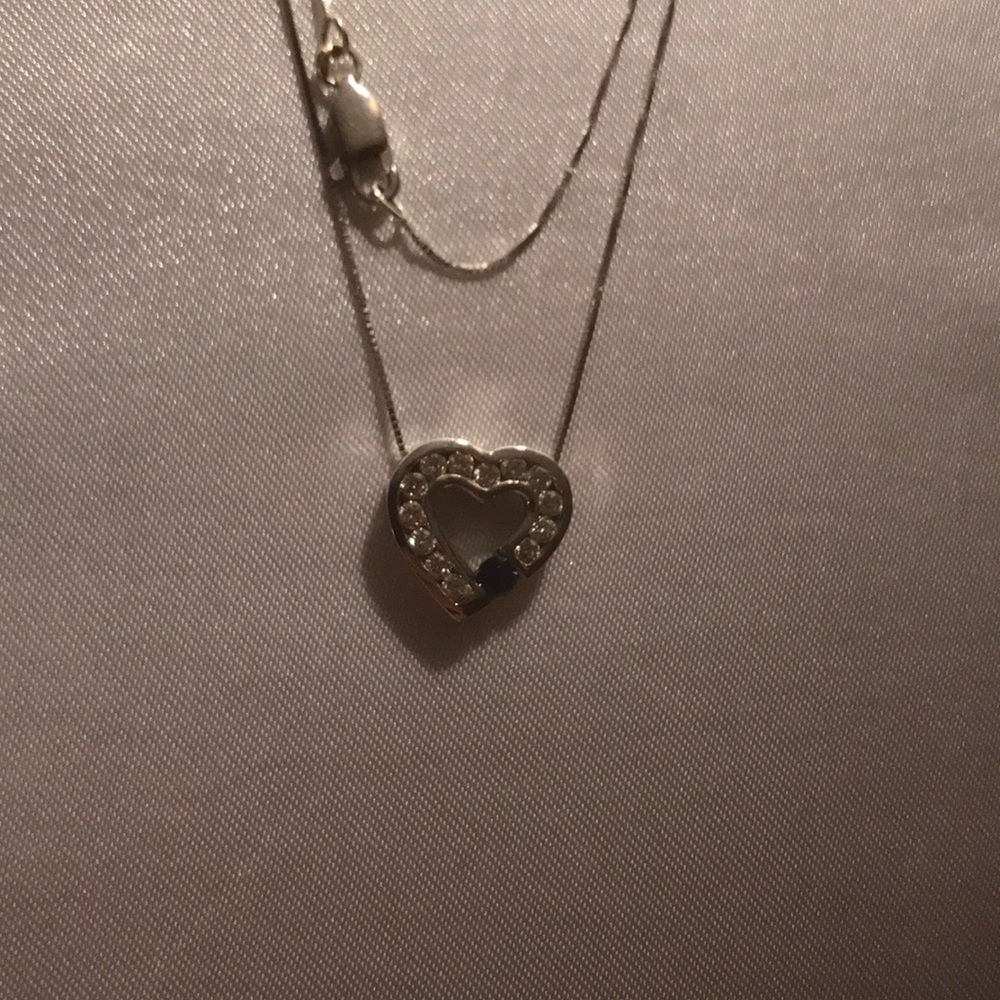 Diamond heart necklace with sapphire stone
